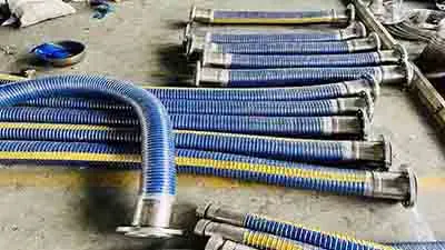 several composite hoses with flange are put on the round