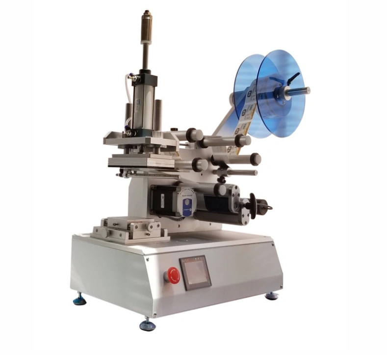 Semi automatic flat labeling machine for bottles box and package.